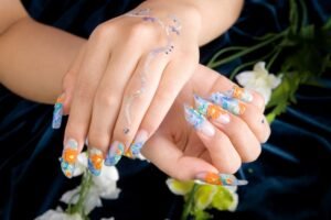 beautiful hands with jelly stickers for nails with art on it